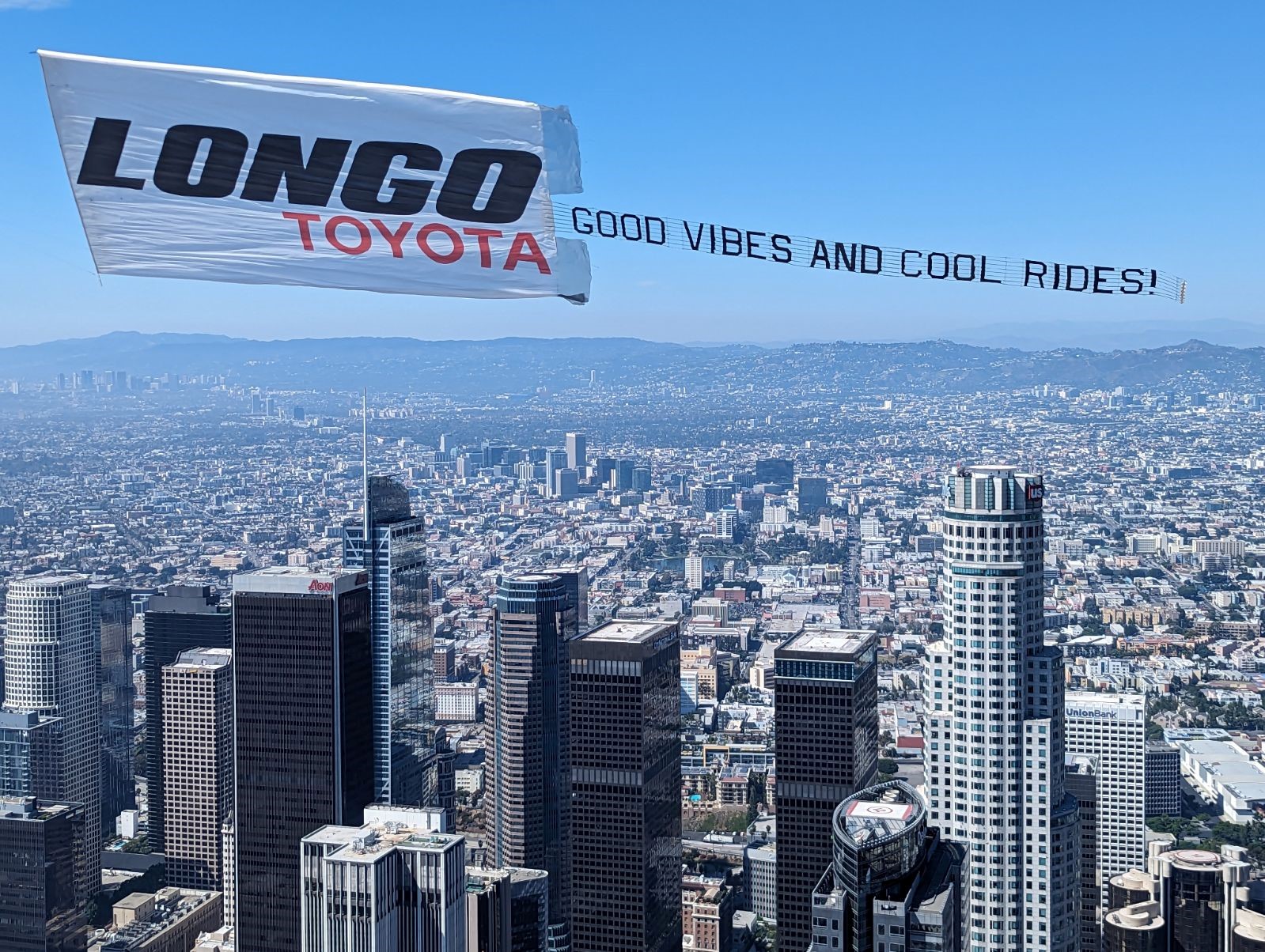 Longo Toyota Logo with letter banner